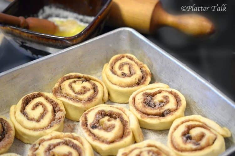 a tray of uncooked cinnamon rolls