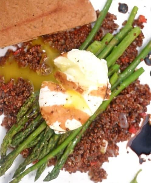 A plate of food with eggs and vegetables.