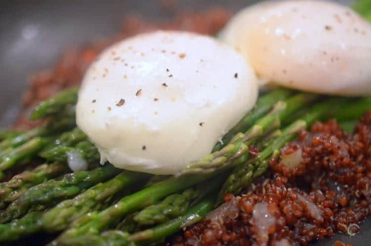 A close up of a plate of food with Egg and Quinoa.