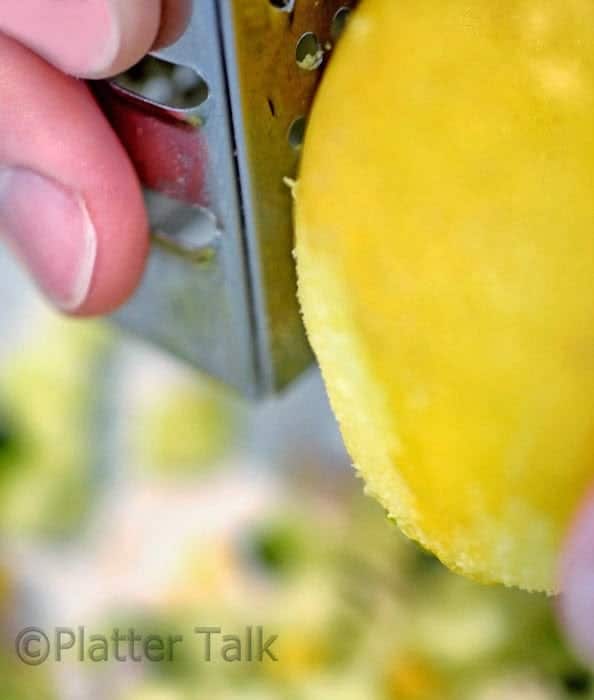  Someone zesting a lemon