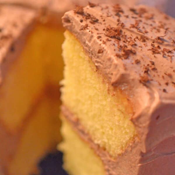 A white cake with chocolate pudding frosting.