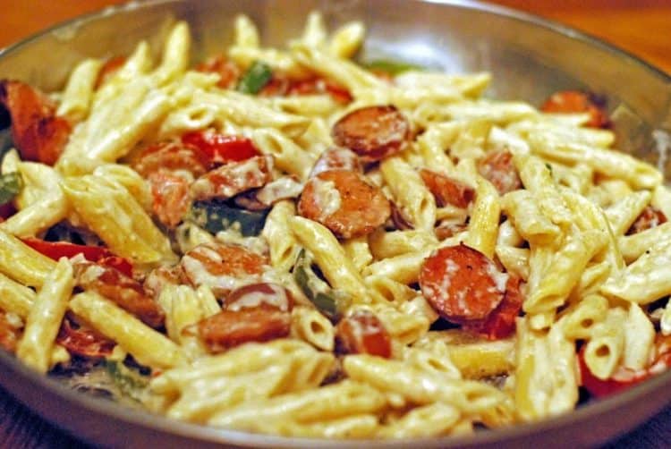 A close up of pasta in a bowl, with Sausage and Penne