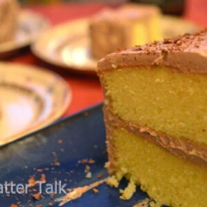 a slice of cottage cake with whipped frosting