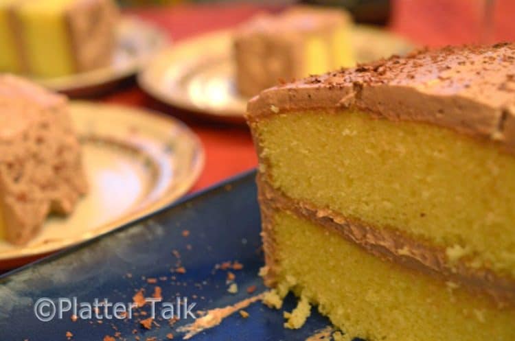a slice of cottage cake with whipped frosting