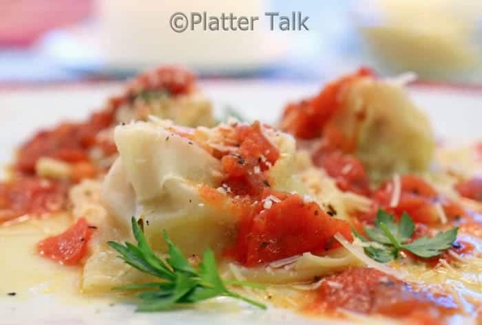 A bunch of ravioli on a plate.