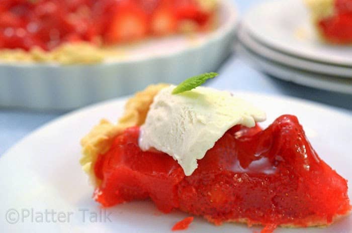 a slice of strawberry pie on a plate