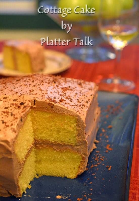 a plate of cottage cake with whipped frosting