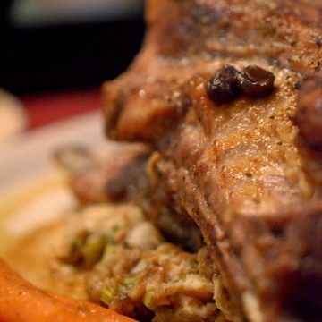 Spareribs on a plate with stuffing.