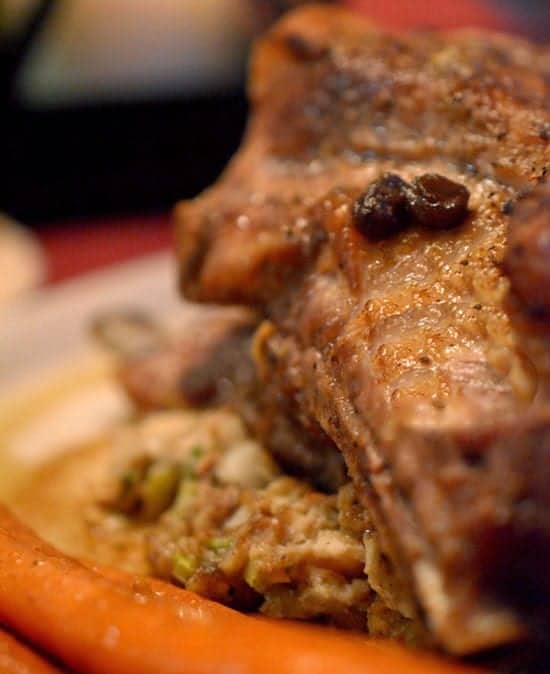 Spareribs on a plate with stuffing.