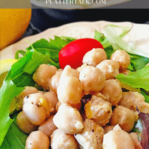 A plate of food, with chickpea salad