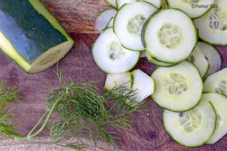 cucumber slices on a cutting board.