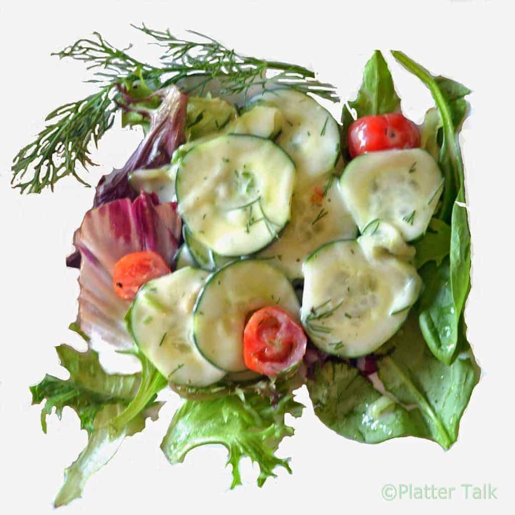 A close-up of a cucumber salad.