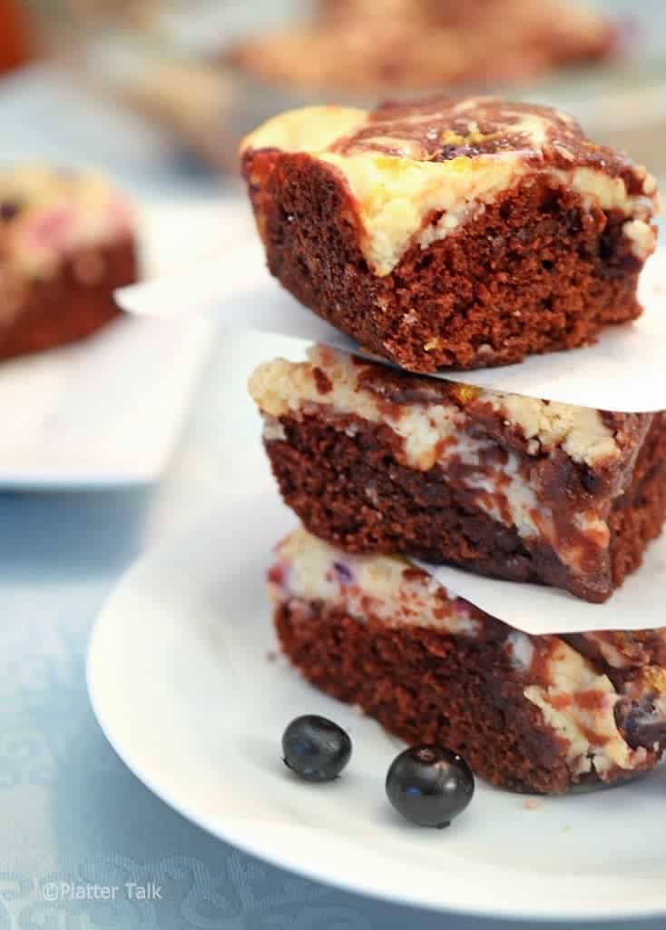 A stack of blueberry brownies.