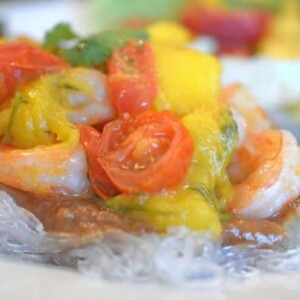 Asian shrimp and mango peach chutney on a plate