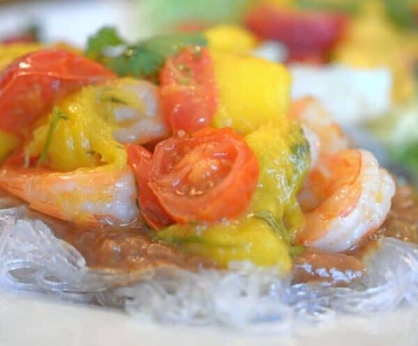 Asian shrimp and mango peach chutney on a plate