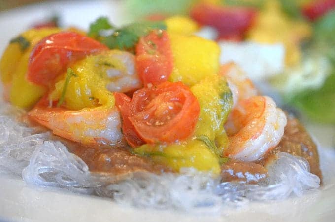 A plate of shrimp with peach.