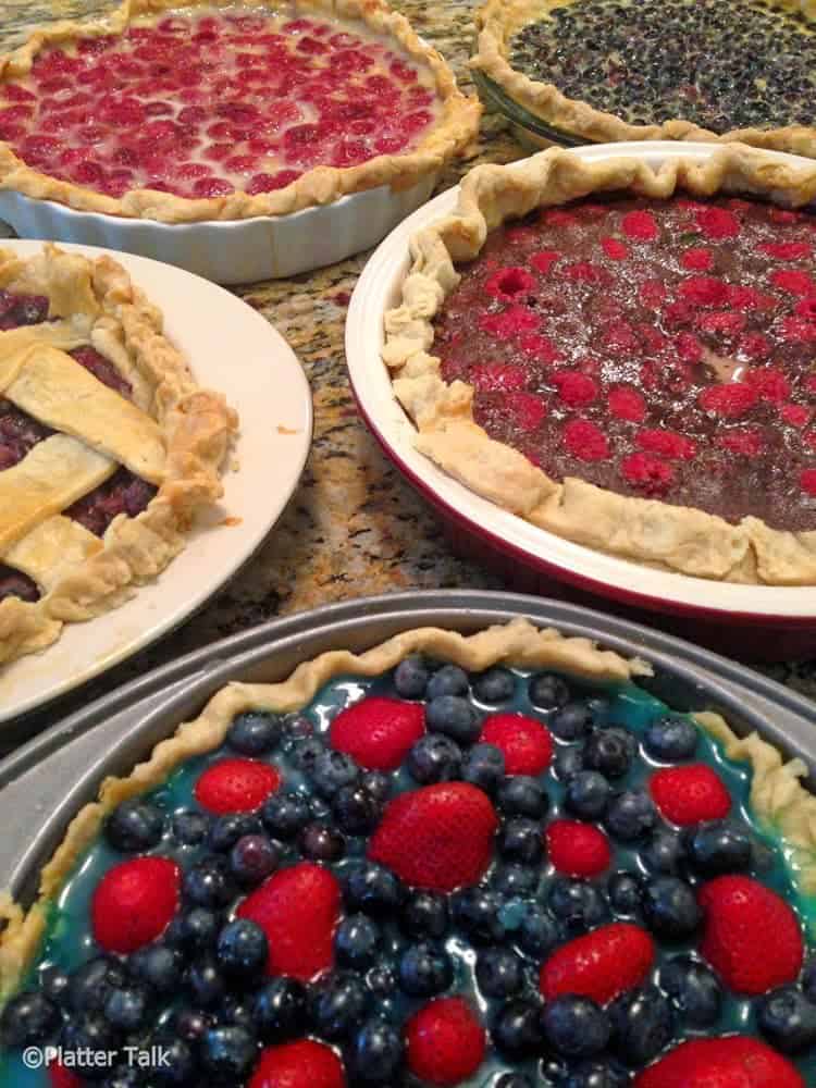 A group of homemade berry pies