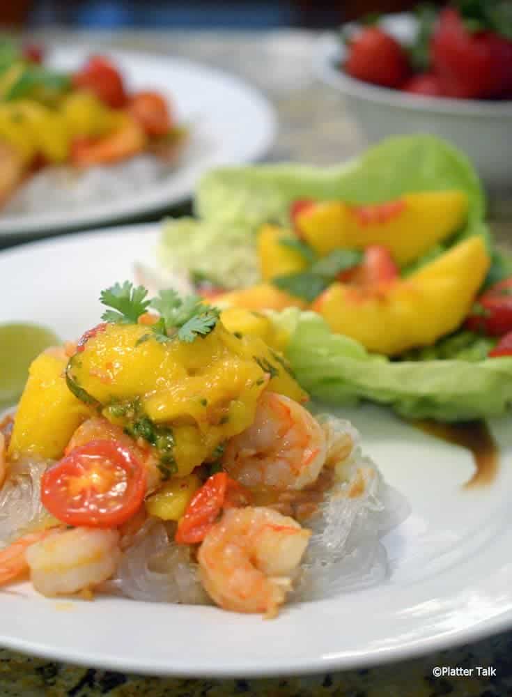 A plate of Asian shrimp and mango peach chutney