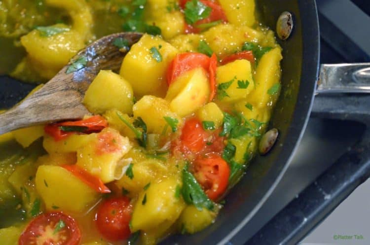 a pot of Asian shrimp with mango peach chutney