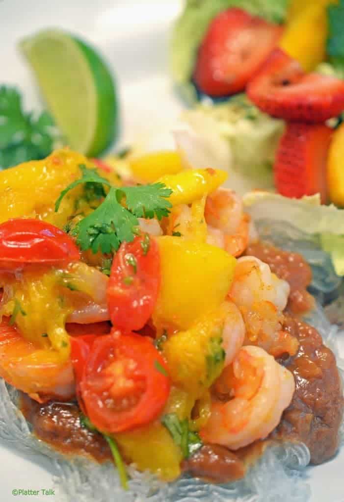 a close up of Asian shrimp and mango peach chutney