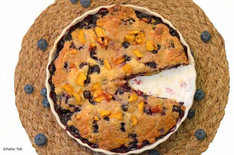 a dish of blueberry and peach yogurt streusel 