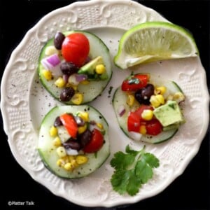 Cucumbers on a plate with salsa.