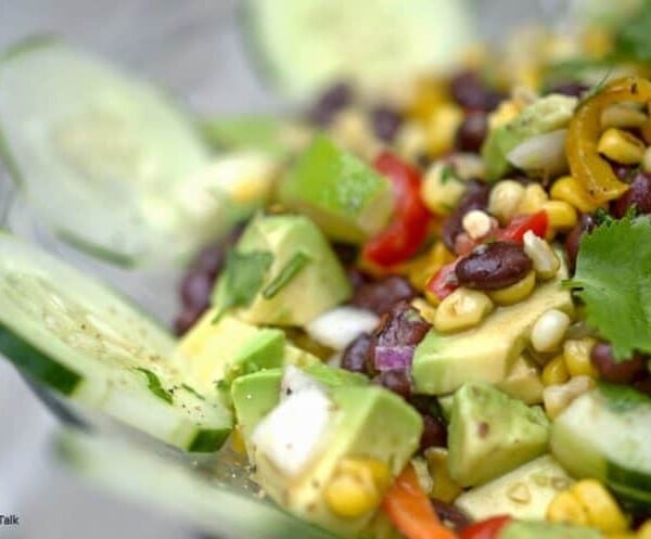 Roasted salsa in a bowl with cucumber.