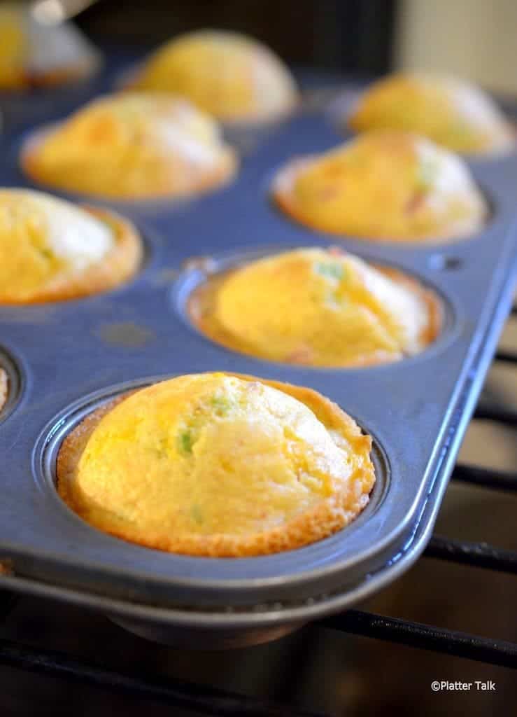 A pan of muffins on a table.