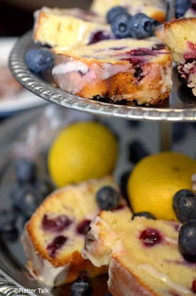 Slices of blueberry bread on a stand.