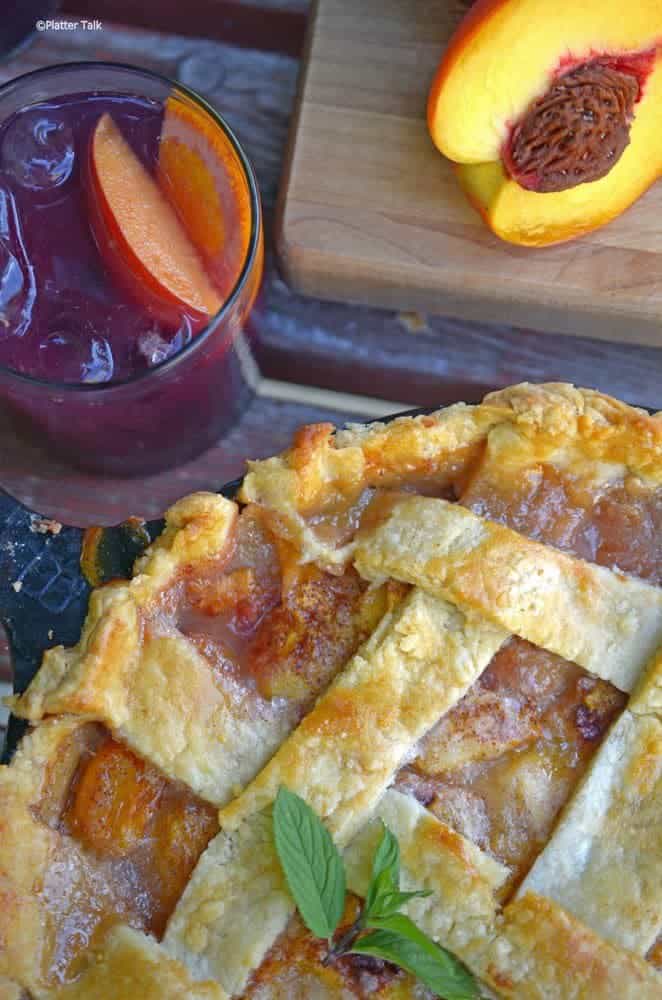 A homemade peach pie with sangria