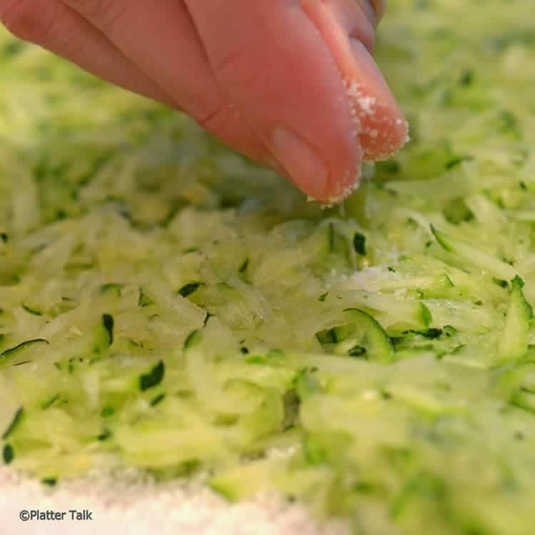 A close up of shredded zucchini. 