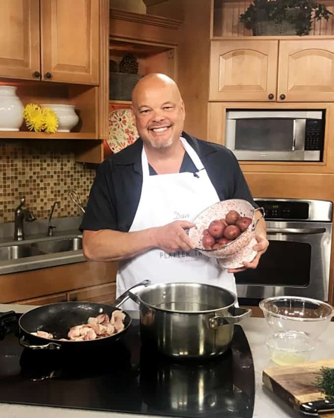 A man in a kitchen.