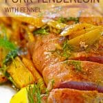 Roasted Pork Tenderloin garnished with fennel and lemon on white serving plate.