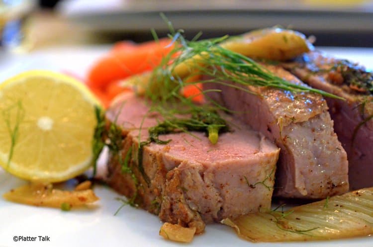 Pork tenderloin slices on a plate