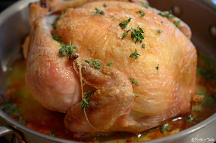 A closeup of a roasted chicken