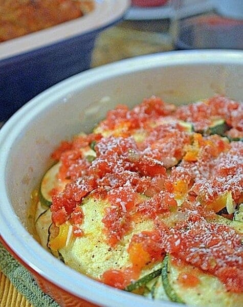 A close up of a bowl of food on a plate, with Salsa