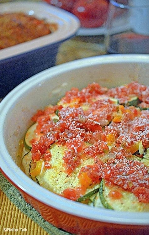 A close up of a bowl of food on a plate, with Salsa