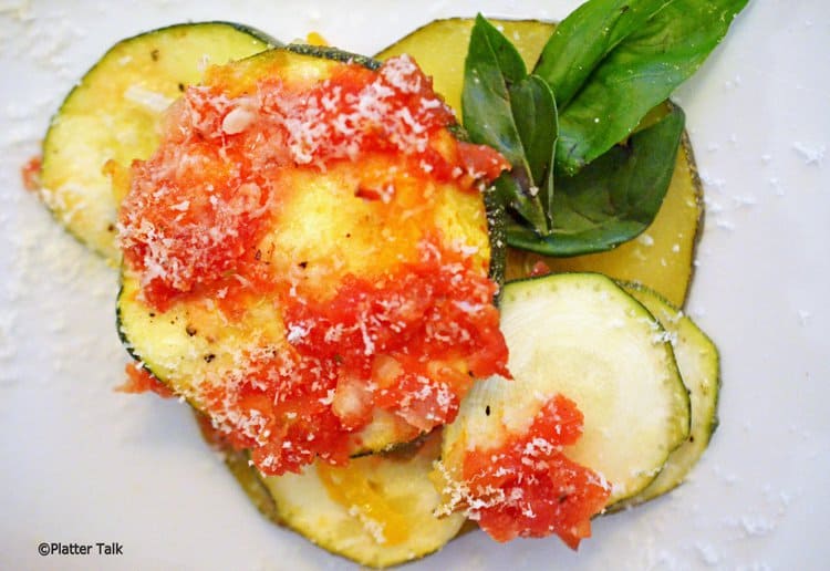 A close up of a plate zucchini bake.