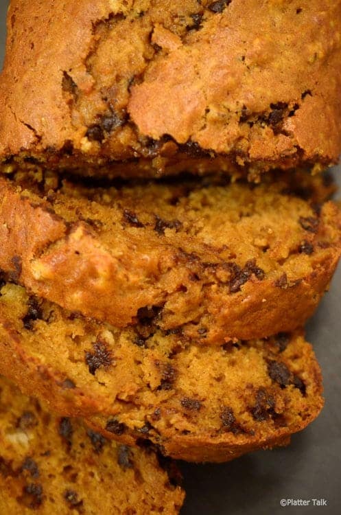 A close-up of a piece of pumpkin bread.