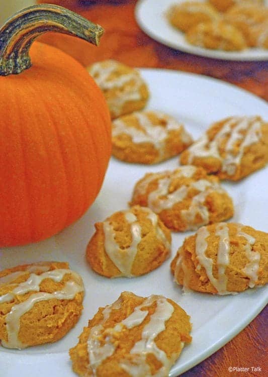 A plate of food on a table, with Cookie and Pumpkin