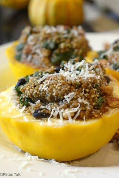 quinoa stuffed squash recipe on platter talk food blog