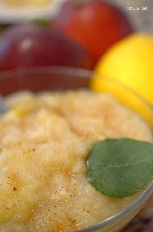 A close up of a bowl of applesauce