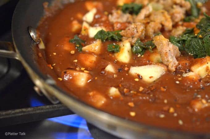 A close up of a pan of food, with Gnocchi