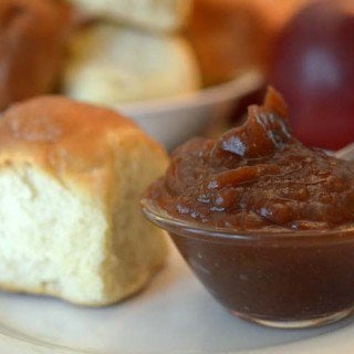 dinner roll with dish of apple butter