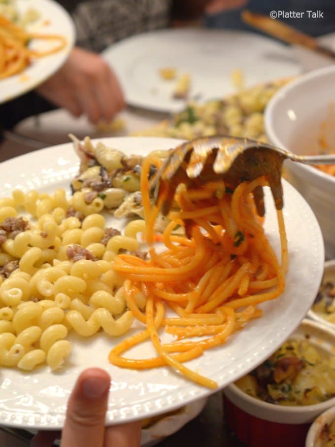A plate of food on a table with pasta