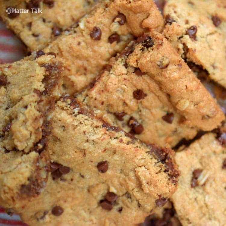 A close-up of dessert bars in a bowl.