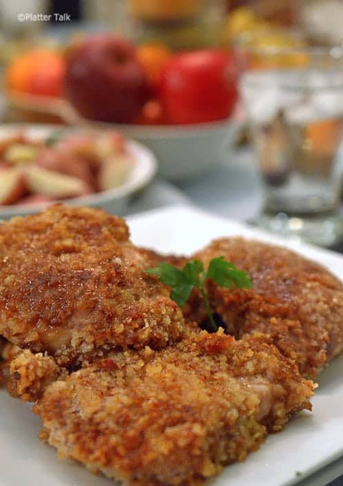 A close up of a plate of food, with Pork Cutlets