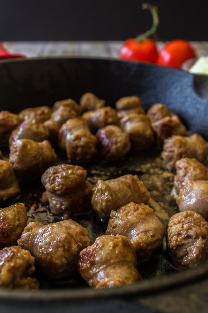 turkey Italian sausage in a skillet.