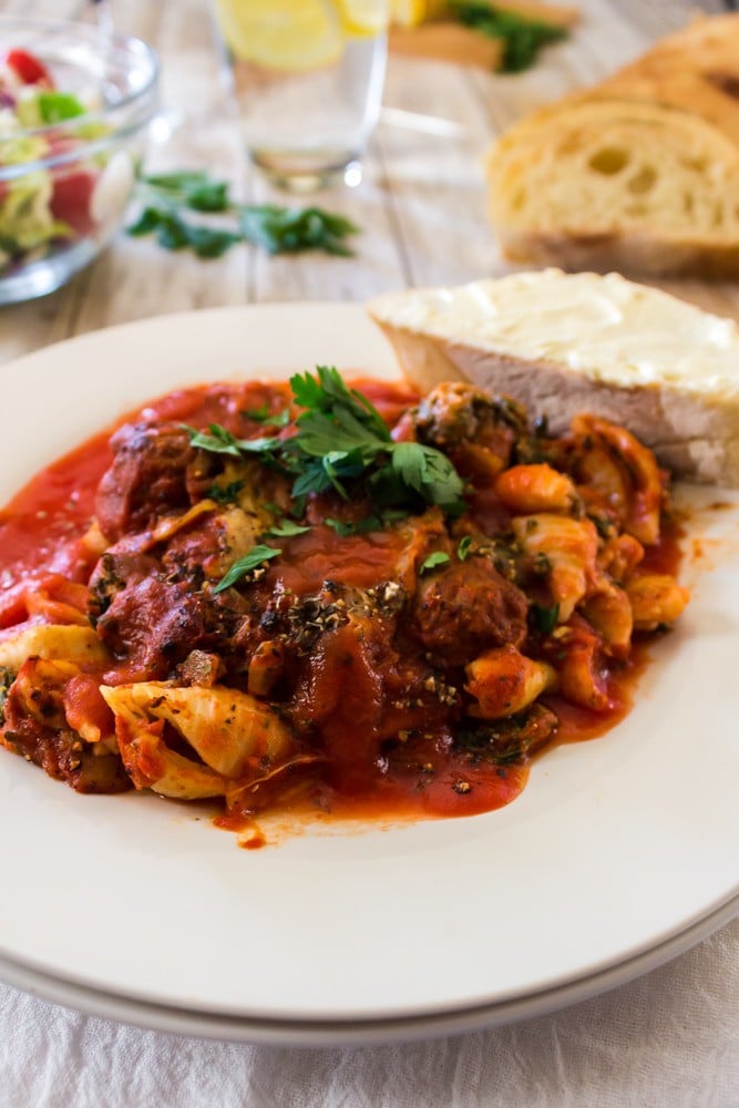 plate of skillet lasagna with bread.