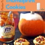 Thumbprint cookies with pumpkin in the background